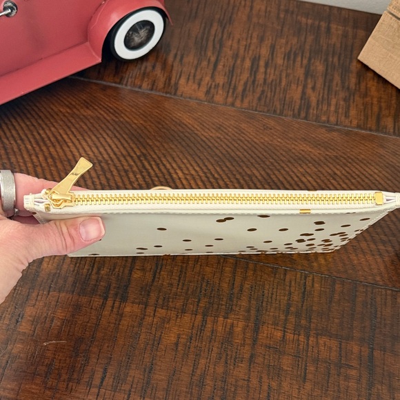 **Bundle** Kate Spade Ivory Pouch with Metallic Gold Dots, earrings & bag charm! - Picture 7 of 8